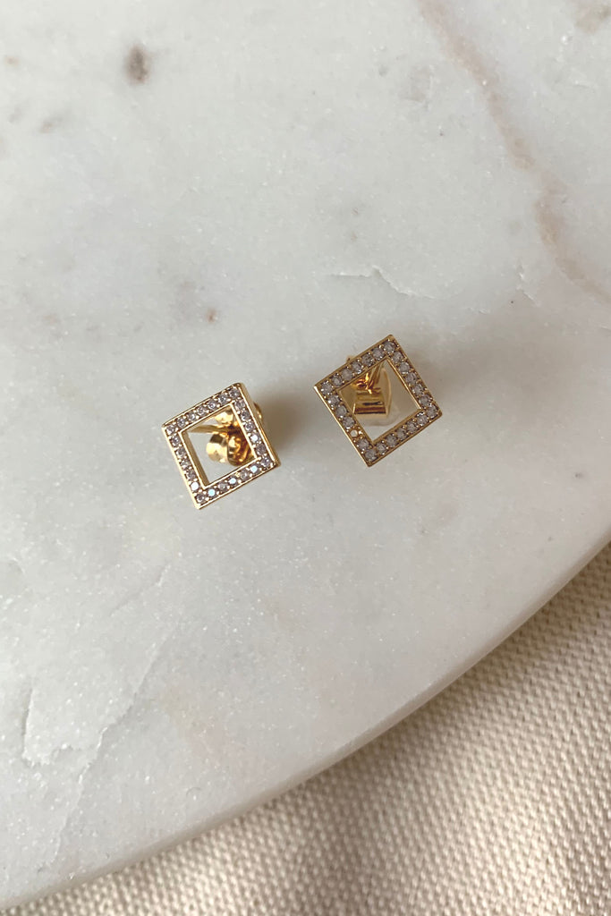 A stunning addition to any jewelry collection, these hypoallergenic 14k gold dipped small open pave square studs add a hint of glamour to your outfit. Perfect for everyday wear! They are lightweight and elevated too. 