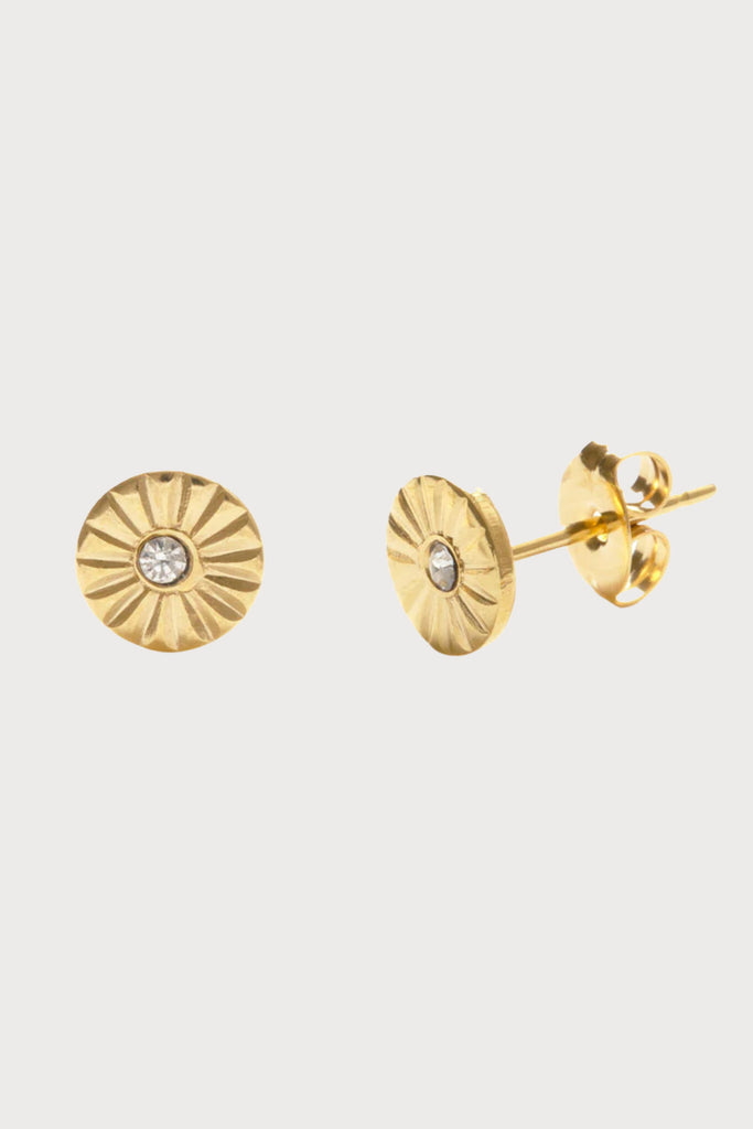 These sweet Wink Studs from Amano Studio will light up your look with a wink of sparkle and shine. Featuring 23k gold plating and Czech Crystal