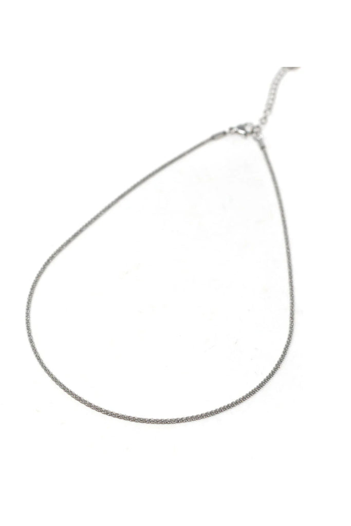 The Sis Kiss Rope Chain Necklace is a sleek "untwisted" rope chain that's dainty and shimmery. It's fun for for layering with other necklaces. Choose one of our Sis Kiss Charms to add a little flare and customize your look!