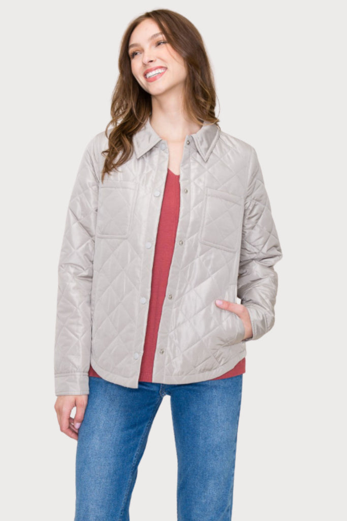 Stay comfortable and stylish in the Everly Snap Button Quilted Jacket! Crafted for medium to light-weight wear, this stylish sand jacket features a quilted design, snap front buttons, and two front pockets, plus additional side pockets for all your belongings. It is perfect for on the go and the color will match with everything! 
