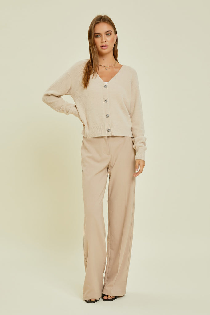 cream  neck soft stretchy cardigan with jewel buttons. perfect holiday cardigan