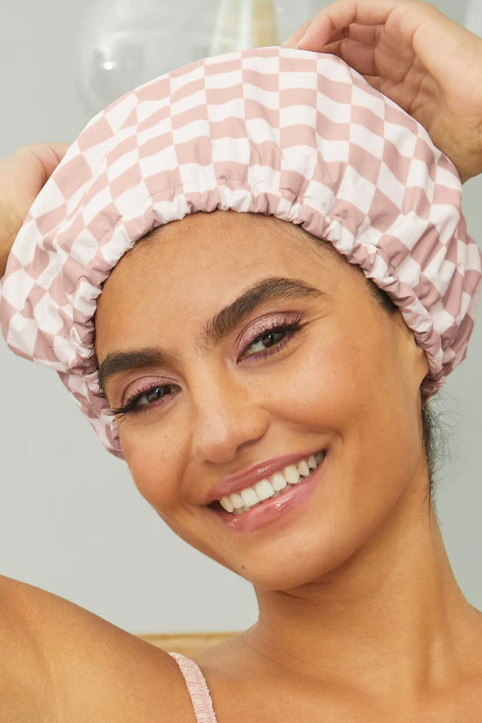 The Kitsch Satin Lined Flexi Shower Cap is a great self-care goodie, perfect keeping your hair secure in and out of the shower. It fully covers the head, is waterproof, and has a lux satin lining. 
