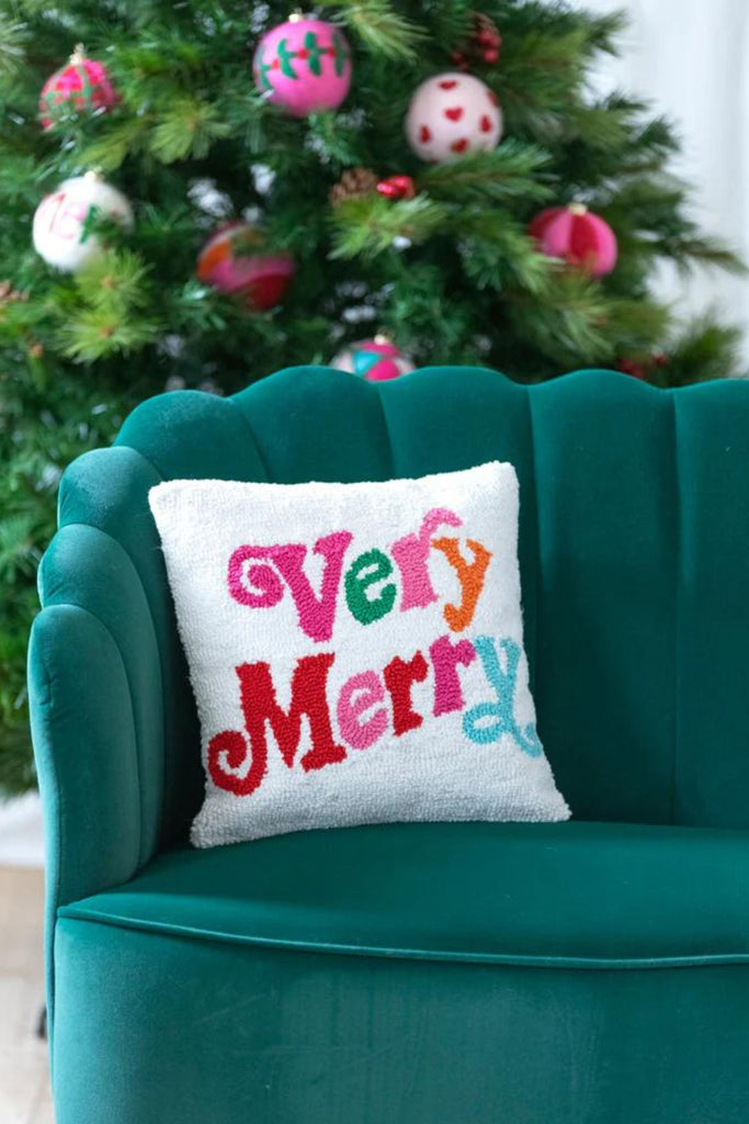 The Very Merry 14"x14" Pillow is super bright and fun! It's the perfect decor piece to add some color to your home. 