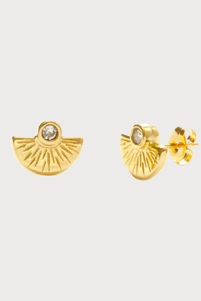 The Sunset Stud Earrings by Amano Studio are inspired by rays of light that emanate from the moment the sun dips below the horizon. Casted in brass and plated in a heavy (7-10 mil) 24 gold and set with a highly faceted Czech crystal, these earrings a beautiful and perfect for everyday wear. 