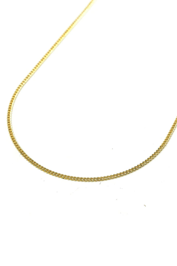 Choose your favorite chains and charms! The Sis Kiss Skinny Curb Chain Necklace is the perfect foundation for a great necklace. It's sleek with 14k plating. Just add one of our Sis Kiss Charms to complete your look! Material: 14k gold or sterling silver plated brass