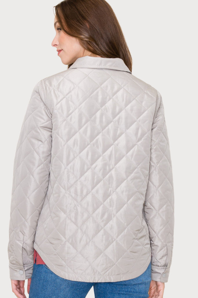 Stay comfortable and stylish in the Everly Snap Button Quilted Jacket! Crafted for medium to light-weight wear, this stylish sand jacket features a quilted design, snap front buttons, and two front pockets, plus additional side pockets for all your belongings. It is perfect for on the go and the color will match with everything! 