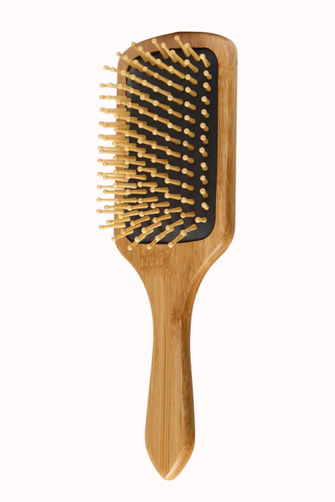 This Bamboo Hair Brush is a fun sticking stuffer for the holidays! The design is super cute, featuring a bamboo handle and soft bristle brush. Choose between blue or blue/red floral. 