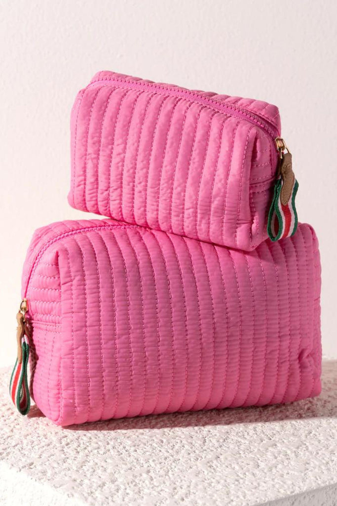 Perfect your on-the-go lifestyle with Shiraleah’s Ezra Small Boxy Cosmetic Pouch. This pouch features a sleek quilted body, and a boxy silhouette, perfectly pairing with Shiraleah’s Ezra Totes. Measuring L 7" × W 3" × H 4", and made from nylon, the Ezra Small Pouch is equipped with an inner zip and slip pocket, maximizing the space this pouch provides.