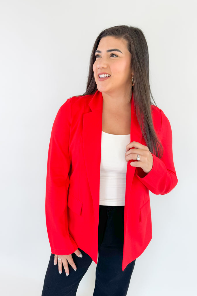 Be confidently stylish in this Alana Stretch Blazer. Its red exterior stretches for a perfect fit and the beautiful blue floral lining adds a playful touch. This style will be perfect for holidays and will remain classic for years to come. You could wear this blazer for holiday events, work, or dress up a casual outfit. 