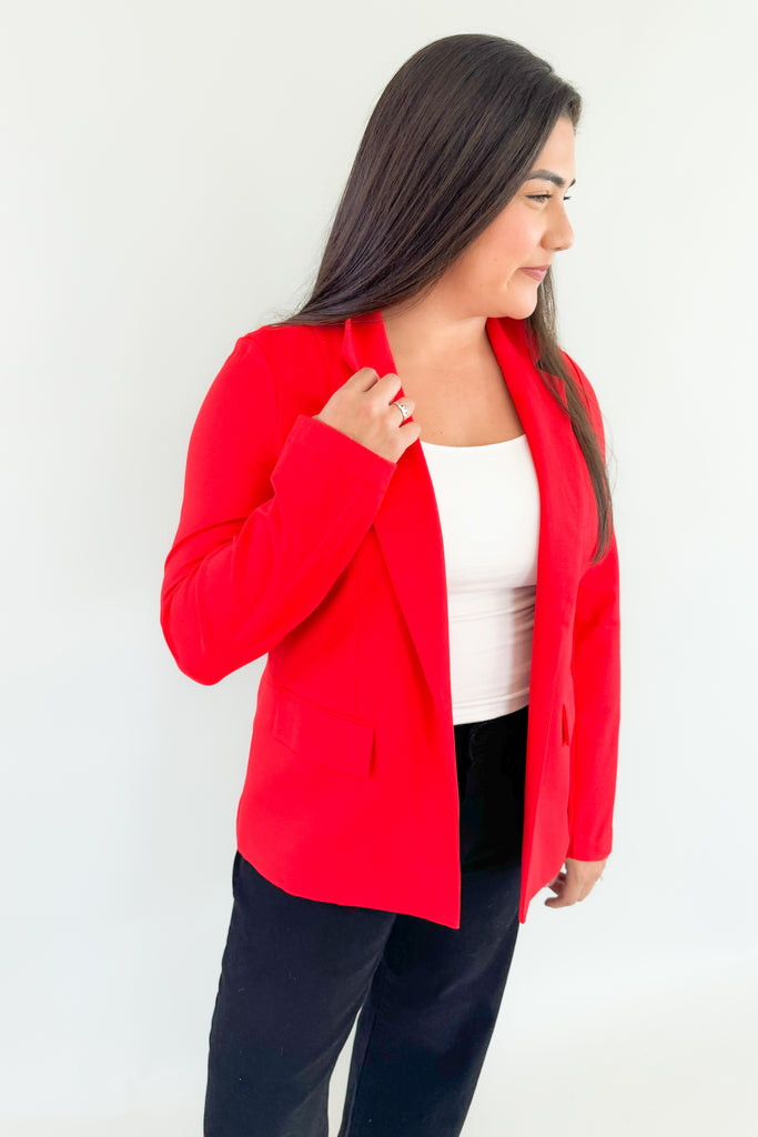 Be confidently stylish in this Alana Stretch Blazer. Its red exterior stretches for a perfect fit and the beautiful blue floral lining adds a playful touch. This style will be perfect for holidays and will remain classic for years to come. You could wear this blazer for holiday events, work, or dress up a casual outfit. 