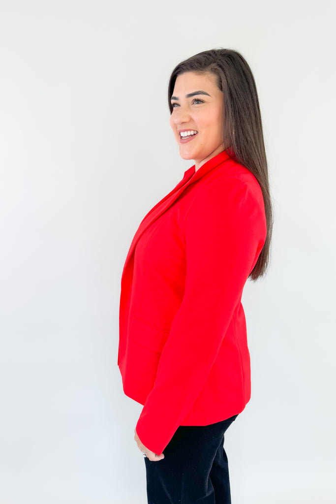 Be confidently stylish in this Alana Stretch Blazer. Its red exterior stretches for a perfect fit and the beautiful blue floral lining adds a playful touch. This style will be perfect for holidays and will remain classic for years to come. You could wear this blazer for holiday events, work, or dress up a casual outfit. 