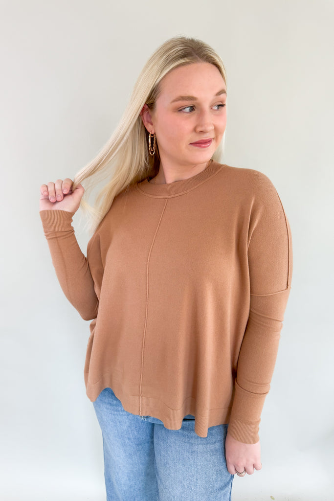 The Always Center Seam Square Hem Sweater is a must-have for the upcoming season. The fabric is extremely soft and lux, giving a chic look. both colors are classic too, so you know you will wear it again and again. You could easily wear this cozy sweater on its own, or layered under jackets. 