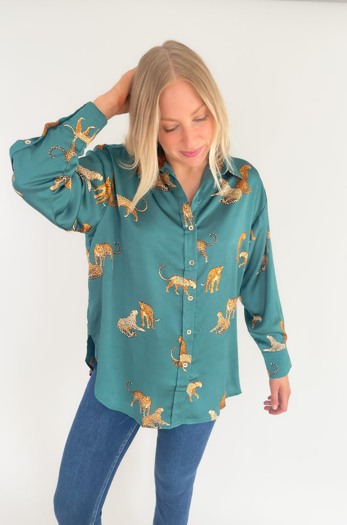 Introducing the Leopard Around Town Button Up Long Sleeve Blouse – an oversize silhoette with a timeless leopard print. It offers both style and comfort. Crafted from a lightweight satin fabric, it's perfect for the office or a night out! 