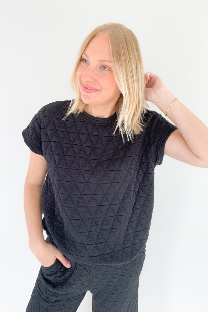 The Ashlee Quilted Short Sleeve Top is elevated with a unique quilted texture and boxy shape. It is very flattering and trendy while remaining comfortable. The style is not heavy either.