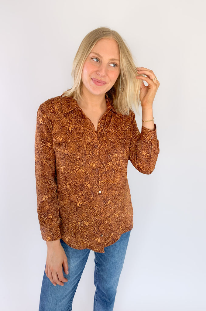 This wear with anything woven sateen blouse is a fabulous piece designed in by Liverpool Los Angeles. The exclusive Autumn Safari Button Up Printed Blouse pairs with denim or trousers for multiple looks.