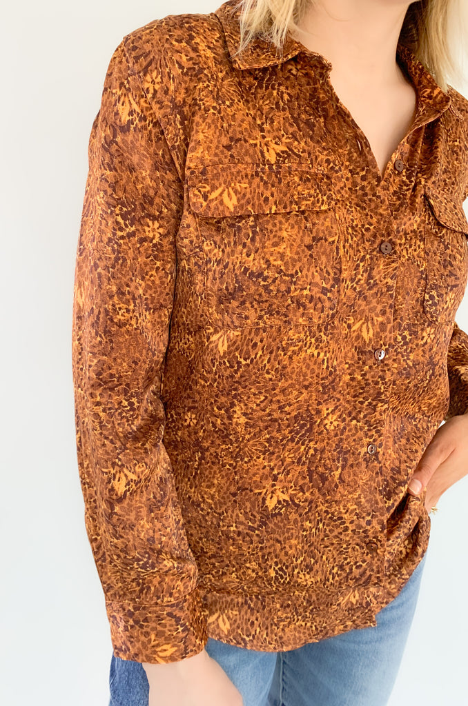 This wear with anything woven sateen blouse is a fabulous piece designed in by Liverpool Los Angeles. The exclusive Autumn Safari Button Up Printed Blouse pairs with denim or trousers for multiple looks.