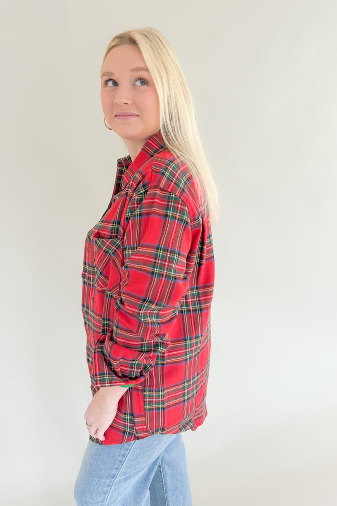 Make a bold and confident statement with this Avril Classic Oversized Flannel! This eye-catching flannel features a bright blue base and striking red, green, yellow and white plaid stripes. It screams classic holiday and is a great layering piece. You can dress it up or down for countless looks. 