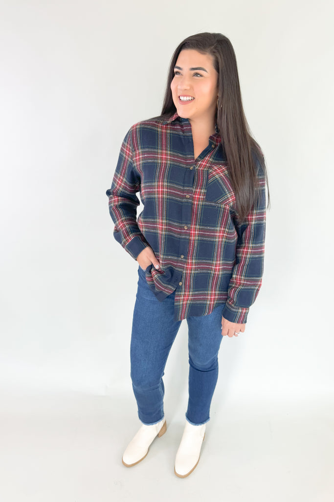 Make a bold and confident statement with this Avril Classic Oversized Flannel! This eye-catching flannel features a bright blue base and striking red, green, yellow and white plaid stripes. It screams classic holiday and is a great layering piece. You can dress it up or down for countless looks. 