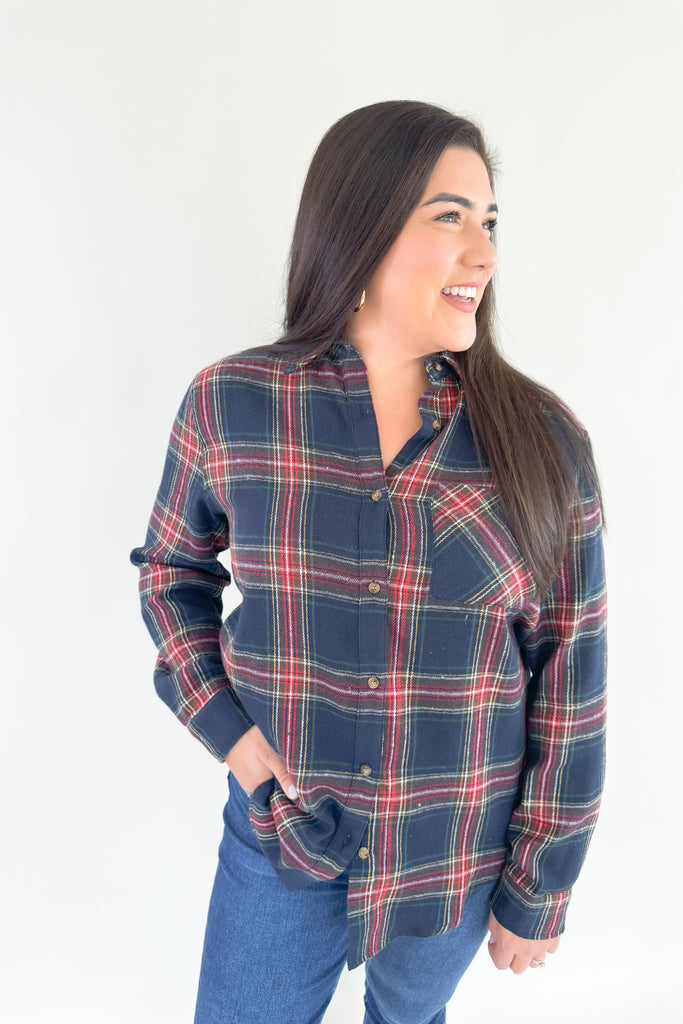 Make a bold and confident statement with this Avril Classic Oversized Flannel! This eye-catching flannel features a bright blue base and striking red, green, yellow and white plaid stripes. It screams classic holiday and is a great layering piece. You can dress it up or down for countless looks. 