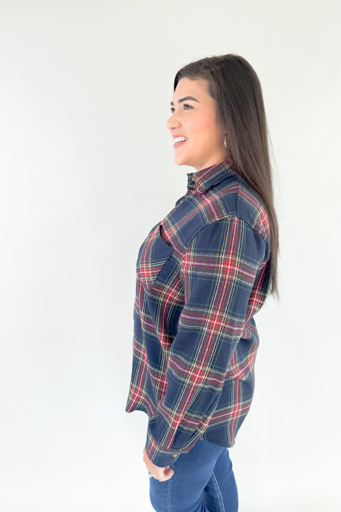 Make a bold and confident statement with this Avril Classic Oversized Flannel! This eye-catching flannel features a bright blue base and striking red, green, yellow and white plaid stripes. It screams classic holiday and is a great layering piece. You can dress it up or down for countless looks. 