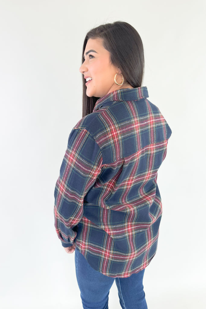 Make a bold and confident statement with this Avril Classic Oversized Flannel! This eye-catching flannel features a bright blue base and striking red, green, yellow and white plaid stripes. It screams classic holiday and is a great layering piece. You can dress it up or down for countless looks. 