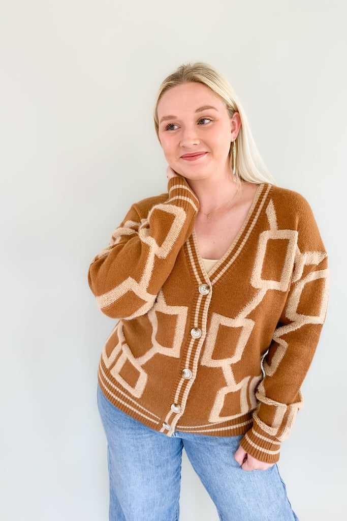 The Becky Patchwork Knit Cardigan is so cozy and fun! It mimics a trendy varsity cardigan with buttons along the front and striped hem, cuff, and neckline details. This style nothing like your average cardigan though, featuring the softest fabric and unique abstract design.