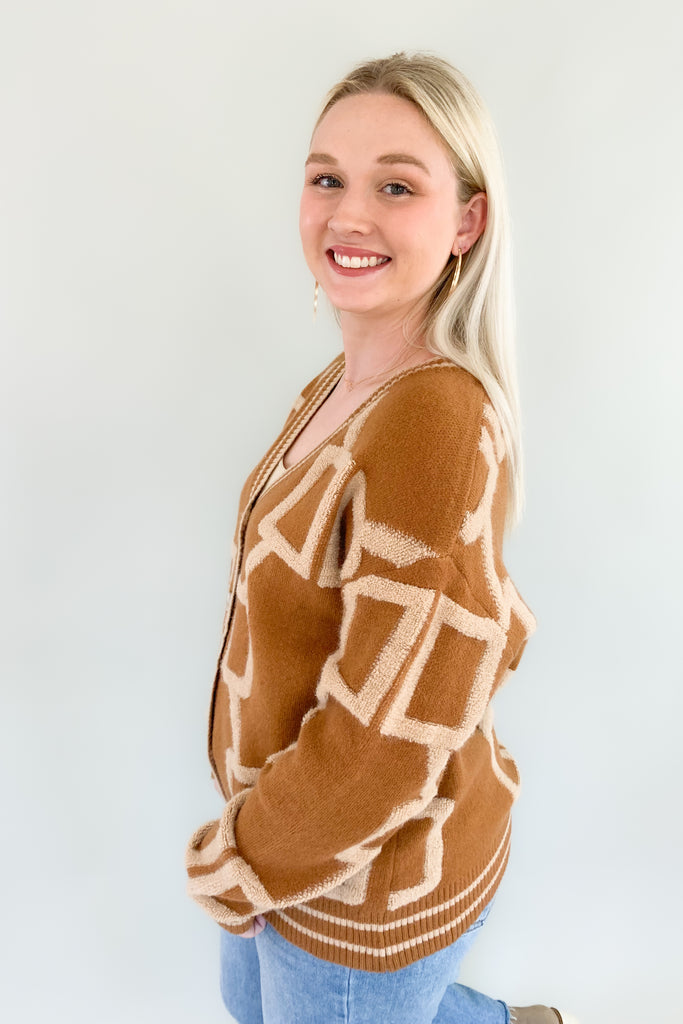 The Becky Patchwork Knit Cardigan is so cozy and fun! It mimics a trendy varsity cardigan with buttons along the front and striped hem, cuff, and neckline details. This style nothing like your average cardigan though, featuring the softest fabric and unique abstract design.