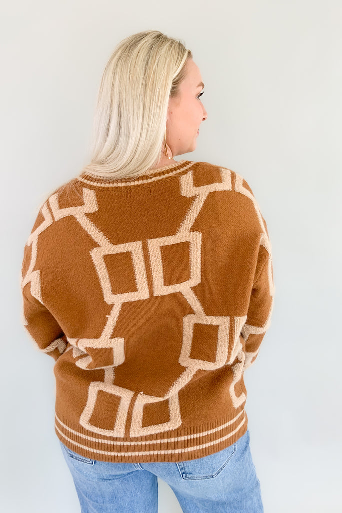 The Becky Patchwork Knit Cardigan is so cozy and fun! It mimics a trendy varsity cardigan with buttons along the front and striped hem, cuff, and neckline details. This style nothing like your average cardigan though, featuring the softest fabric and unique abstract design.