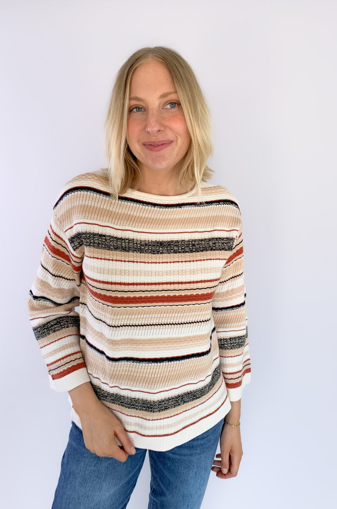 This Liverpool Los Angeles Boat Neck Textured Cream Stripe Sweater features side slits and beautiful rust and cream stripes. Not only is the color and print gorgeous, but the fabric feels like a dream.
