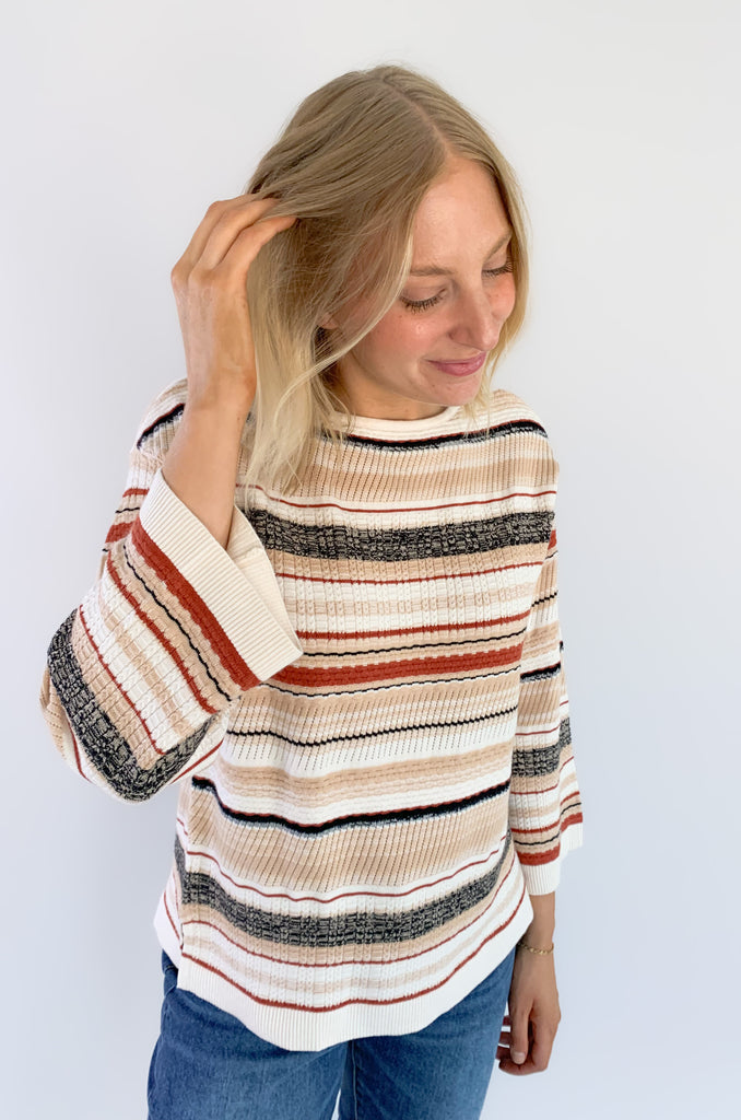 This Liverpool Los Angeles Boat Neck Textured Cream Stripe Sweater features side slits and beautiful rust and cream stripes. Not only is the color and print gorgeous, but the fabric feels like a dream.