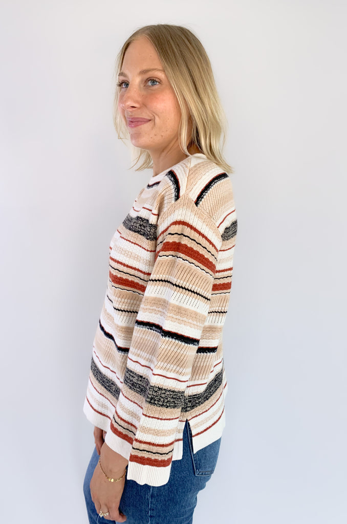 This Liverpool Los Angeles Boat Neck Textured Cream Stripe Sweater features side slits and beautiful rust and cream stripes. Not only is the color and print gorgeous, but the fabric feels like a dream.