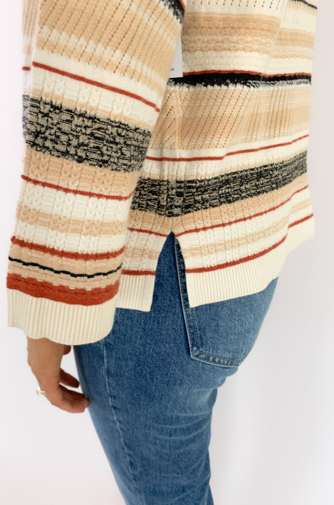 This Liverpool Los Angeles Boat Neck Textured Cream Stripe Sweater features side slits and beautiful rust and cream stripes. Not only is the color and print gorgeous, but the fabric feels like a dream.