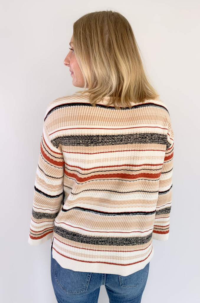 This Liverpool Los Angeles Boat Neck Textured Cream Stripe Sweater features side slits and beautiful rust and cream stripes. Not only is the color and print gorgeous, but the fabric feels like a dream.