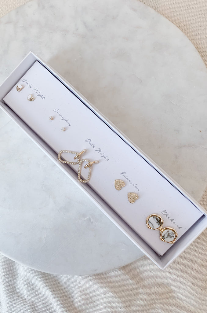 This Boxed Set of 5 Stud Earrings is the perfect way to show your affection! Each set comes with five stud earrings of different styles, so you can mix and match depending on the day. It's perfect for any gift-giving occasion, these stunning gold studs will make a statement no matter who's receiving them.