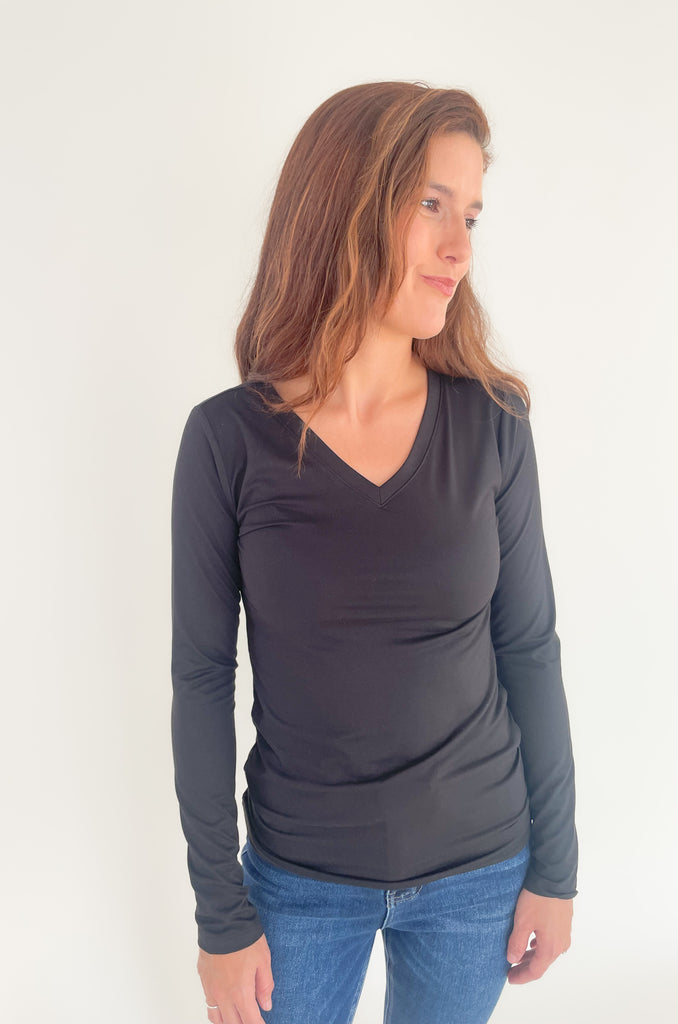 The Black Brushed Microfiber Long Sleeve V Neck is an amazing basic! It's semi-fitted with a soft and stretch material. 