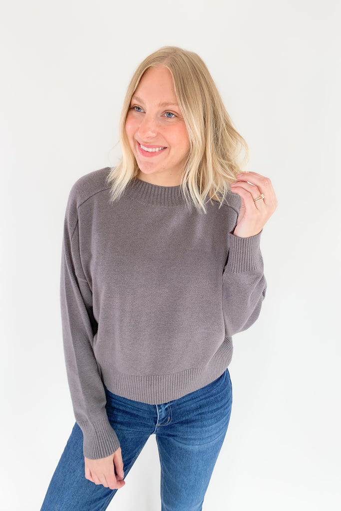 The Charlotte Avery Callum Cropped Crewneck Sweater is ultra soft and cute for everyday wear. Plus, the color is really fun. It's a smokey heather grey that will pair with so many looks. This style also is slightly cropped with an oversized fit. It's perfect for those days you want to feel cozy, but look cute. 