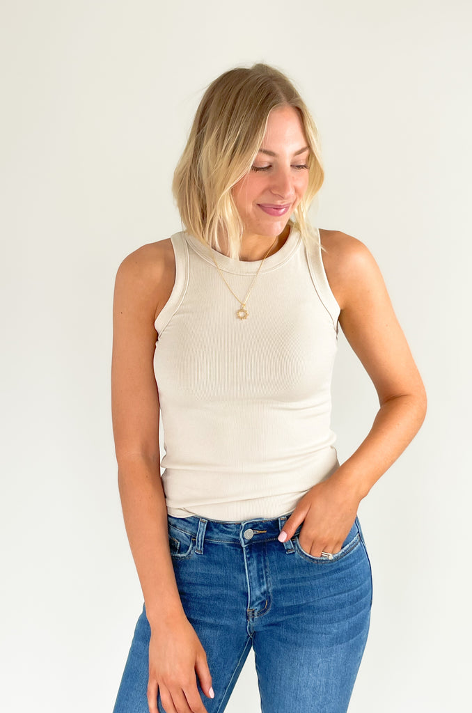 round neck fitted rib tank with plenty of stretch. Available in several colors, including green, sage, teal, black, ivory, brown, and oatmeal