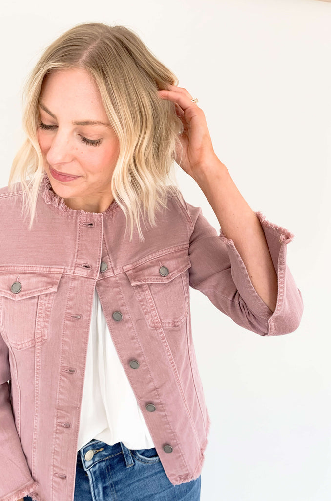 Our Classic Mauve Jean Jacket by Liverpool Los Angeles is the perfect combination of comfort and fashion. The frayed details take this look to the next level, making it ideal for any outing - day or night, work or weekend. Look sharp and stand out from the crowd! 