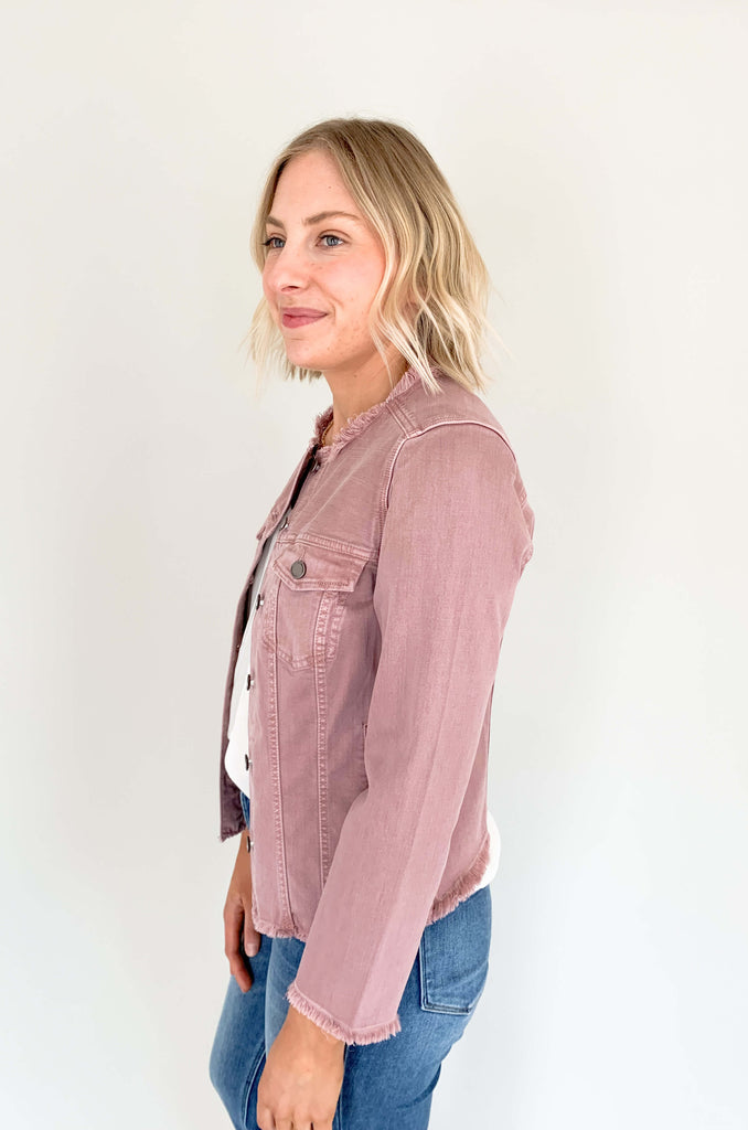 Our Classic Mauve Jean Jacket by Liverpool Los Angeles is the perfect combination of comfort and fashion. The frayed details take this look to the next level, making it ideal for any outing - day or night, work or weekend. Look sharp and stand out from the crowd! 