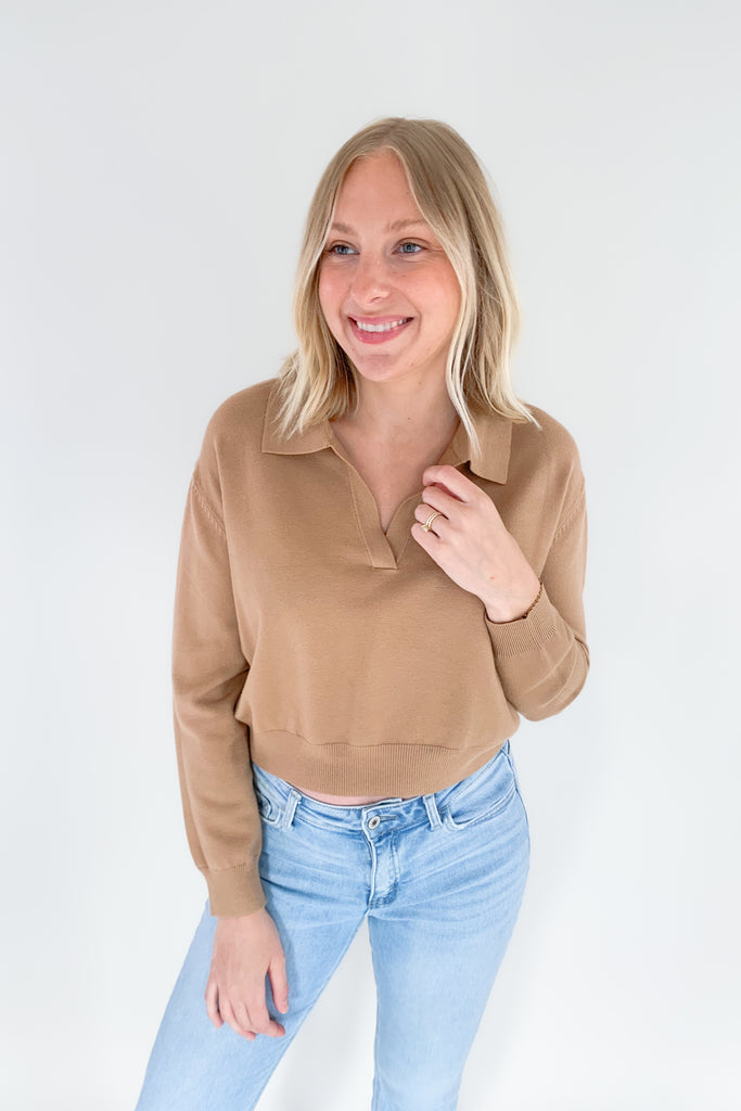 The Charlotte Avery Collared Slightly Cropped Cashmere Sweater is so elevated and right on trend for the season. It's slightly preppy with the collared details. Also, if you like shorter sweaters, this style is for you. Semi-cropped, it hits right at the waist for a flattering look. 