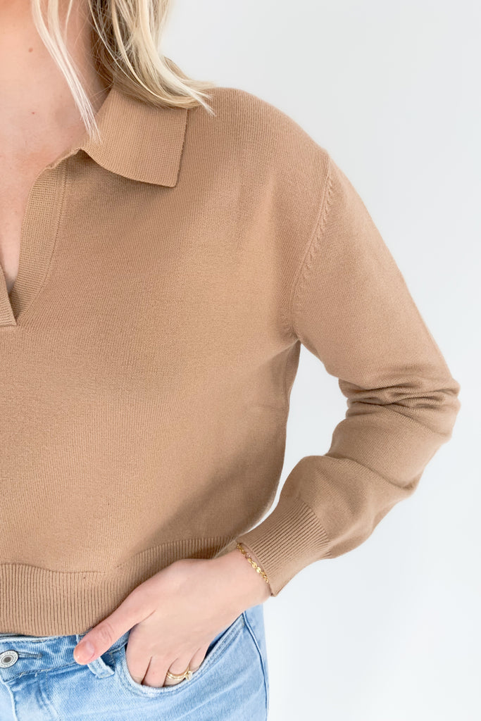 The Charlotte Avery Collared Slightly Cropped Cashmere Sweater is so elevated and right on trend for the season. It's slightly preppy with the collared details. Also, if you like shorter sweaters, this style is for you. Semi-cropped, it hits right at the waist for a flattering look. 