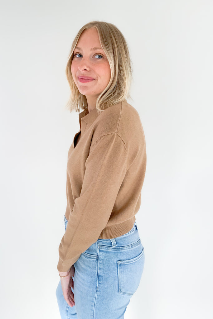 The Charlotte Avery Collared Slightly Cropped Cashmere Sweater is so elevated and right on trend for the season. It's slightly preppy with the collared details. Also, if you like shorter sweaters, this style is for you. Semi-cropped, it hits right at the waist for a flattering look. 