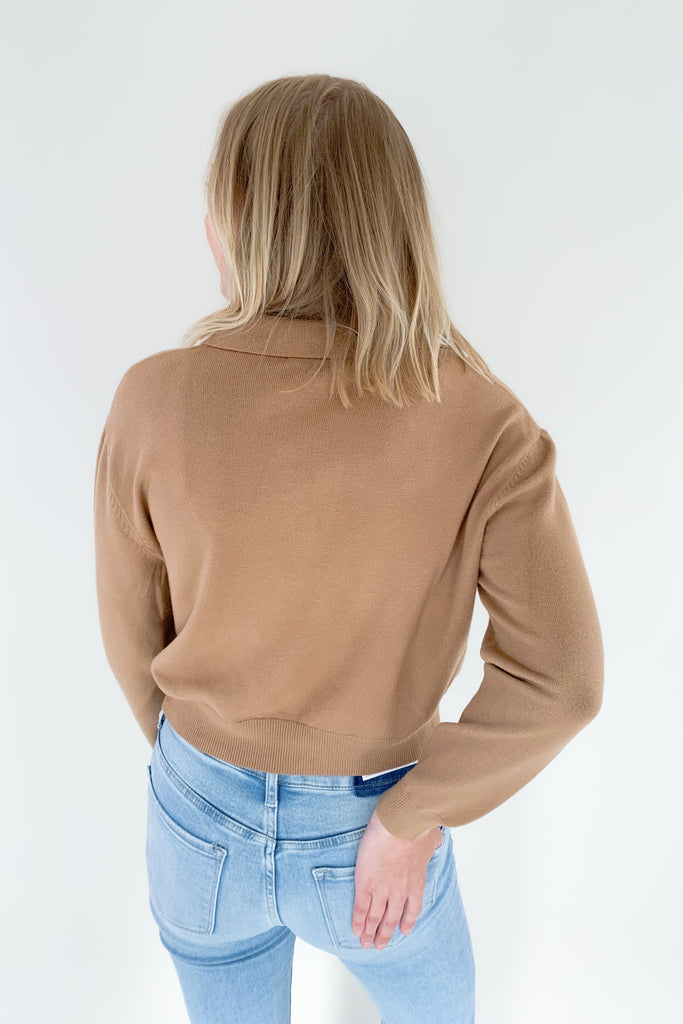 The Charlotte Avery Collared Slightly Cropped Cashmere Sweater is so elevated and right on trend for the season. It's slightly preppy with the collared details. Also, if you like shorter sweaters, this style is for you. Semi-cropped, it hits right at the waist for a flattering look. 