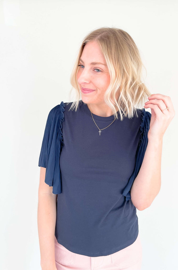 Be a trendsetter in this fluttering, flirty Contrast Pleated Flutter Sleeve Shirt! In a showstopping silhouette, you'll have everyone's eyes on you. Super silky sleeves, with pleats of perfection and contrast body, this blouse is perfect for special events, date night, birthdays, you name it! 