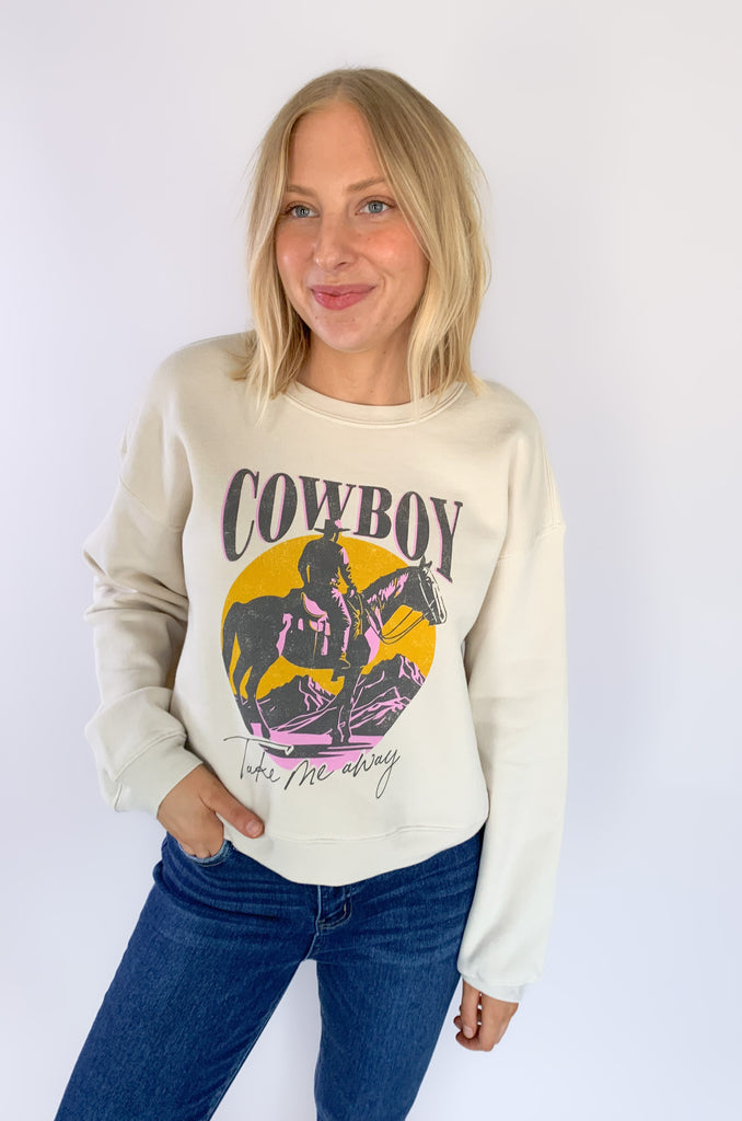 We took our beloved graphics up a notch with this NEW Cowboy Take Me Away Midi Sweatshirt! With the same cozy fleece lining and stretch, it's the perfect combo of cute and casual. Now in a semi-cropped fit, hitting just at the waist with a fun graphic