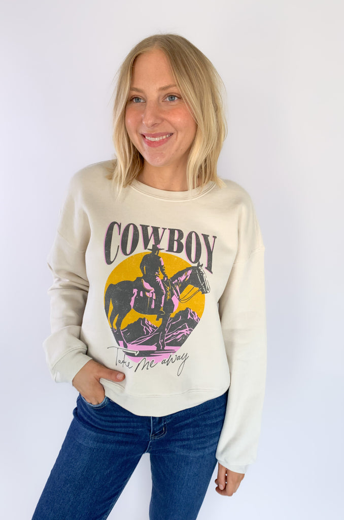 We took our beloved graphics up a notch with this NEW Cowboy Take Me Away Midi Sweatshirt! With the same cozy fleece lining and stretch, it's the perfect combo of cute and casual. Now in a semi-cropped fit, hitting just at the waist with a fun graphic