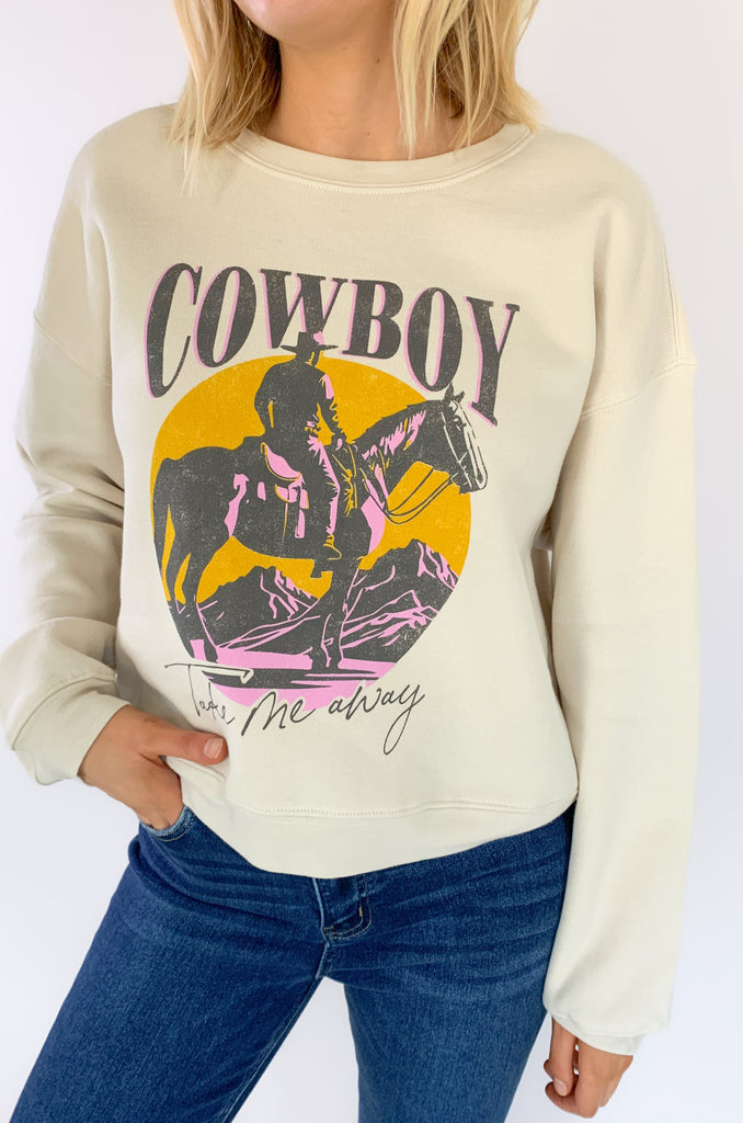 We took our beloved graphics up a notch with this NEW Cowboy Take Me Away Midi Sweatshirt! With the same cozy fleece lining and stretch, it's the perfect combo of cute and casual. Now in a semi-cropped fit, hitting just at the waist with a fun graphic