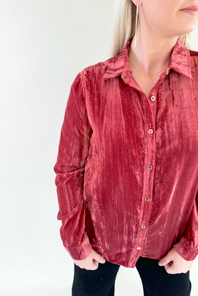 Make a statement in this stylish mauve and red crush velvet shirt! The color is unique and can work for different seasons. Features gold buttons and collared details, perfect for any work or holiday occasion. Look and feel your best with this elevated velvet shirt! 