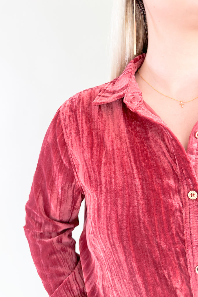 Make a statement in this stylish mauve and red crush velvet shirt! The color is unique and can work for different seasons. Features gold buttons and collared details, perfect for any work or holiday occasion. Look and feel your best with this elevated velvet shirt! 