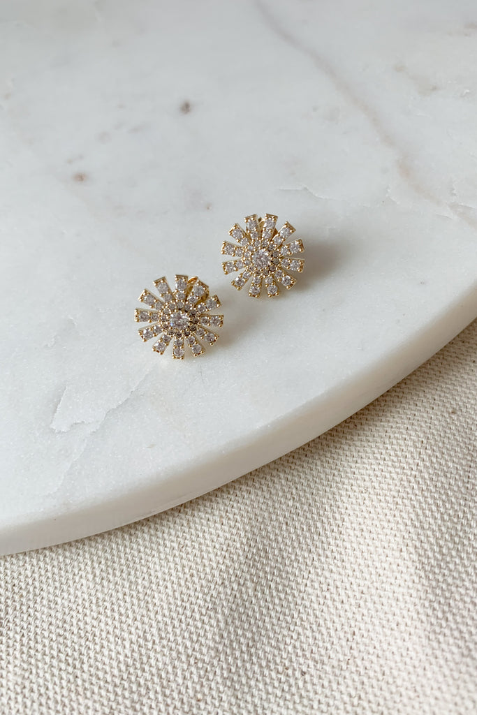 These Crystal Stone Flower Stud Earrings add a bit of sparkle to any look. Crafted from high-quality crystal stones, they provide a subtle, yet eye-catching lift to any outfit. Elegant and timeless, this unique design adds a beautiful, timeless touch to any outfit.